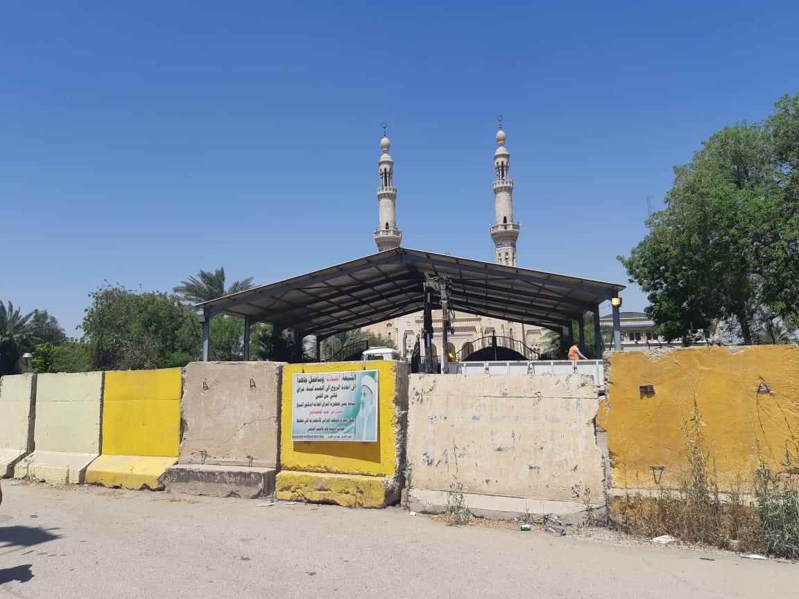 رفع الكتل الكونكريتية من جامع أم الطبول غرب بغداد