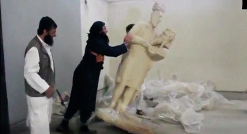 “داعشي” حطم آثار متحف الموصل بقبضة القوات الأمنية