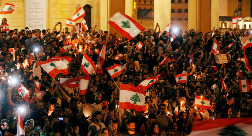 مواجهات بين المحتجين ومناصري “حزب الله” و”أمل” وسط بيروت