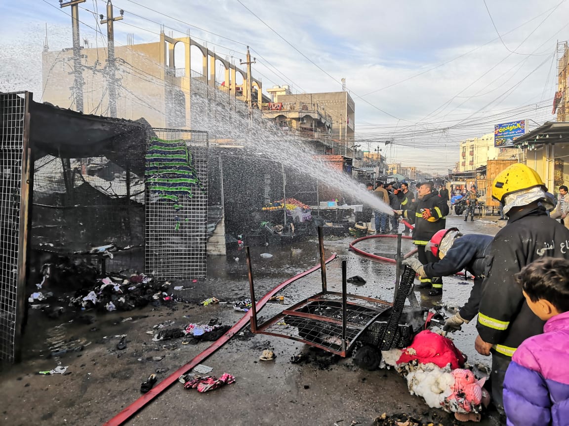 الدفاع المدني يخمد حريق داخل سوق بغداد الجديدة