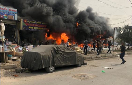 الدفاع المدني تكافح لإخماد حريق “المأمول” وسط بغداد