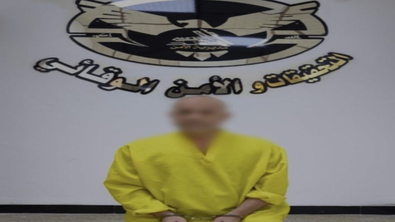 أمن الحشد يعتقل متهماً بعد اعتداءه على صورة لقادة النصر