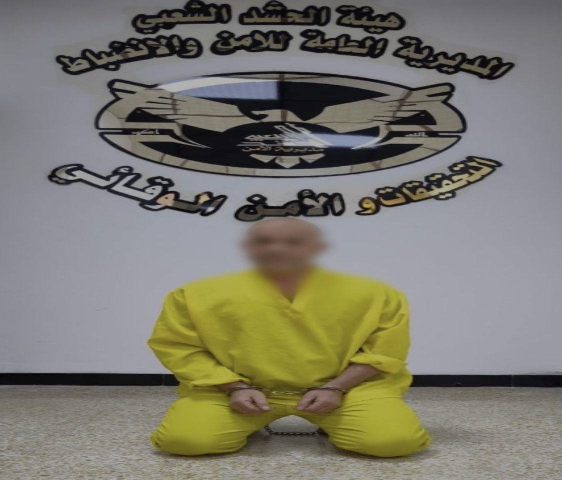 أمن الحشد يعتقل متهماً بعد اعتداءه على صورة لقادة النصر